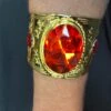 Gold Metal Bracelet With Red Jewel