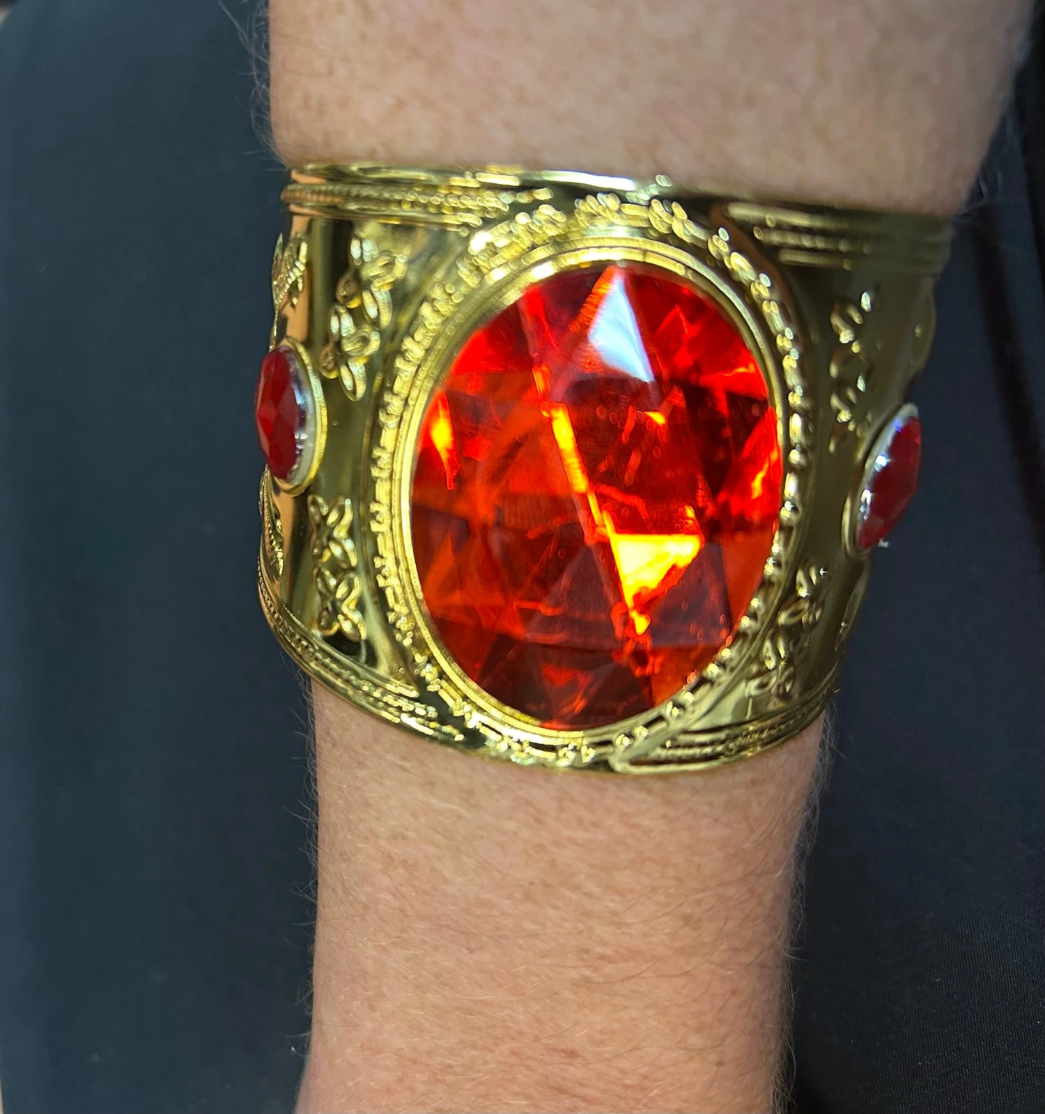 Gold Metal Bracelet With Red Jewel 1 Gold Metal Bracelet With Red Jewel