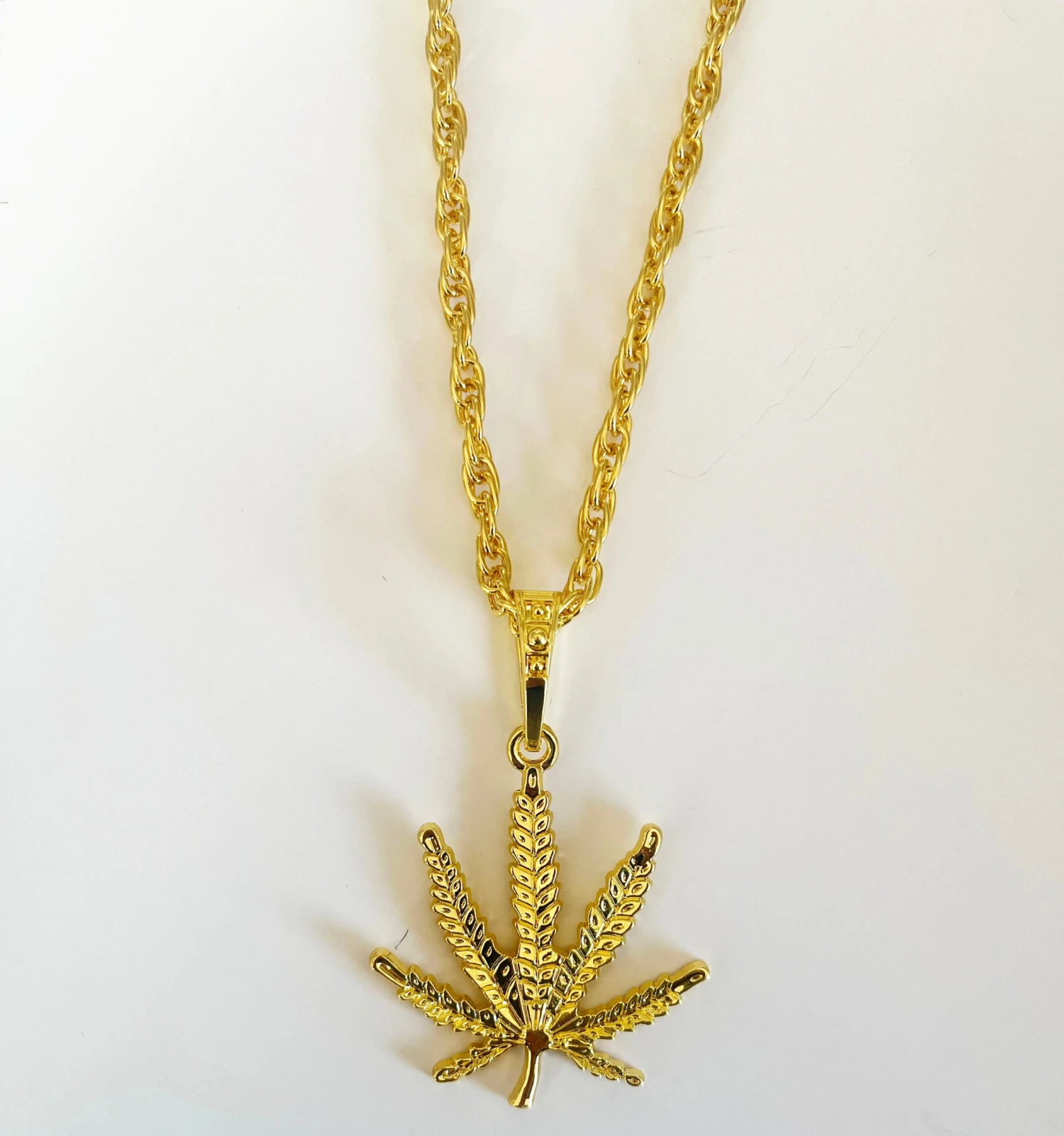 Gold Marijuana Leaf Necklace 1 Gold Marijuana Leaf Necklace